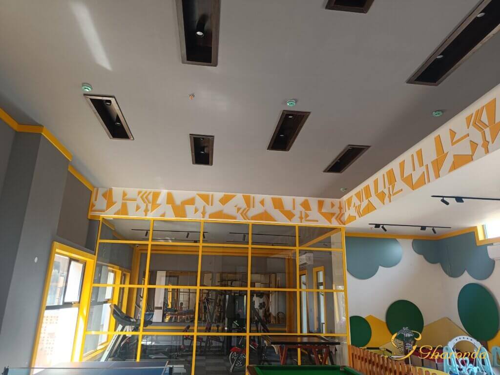 Commercial false ceiling with track lights