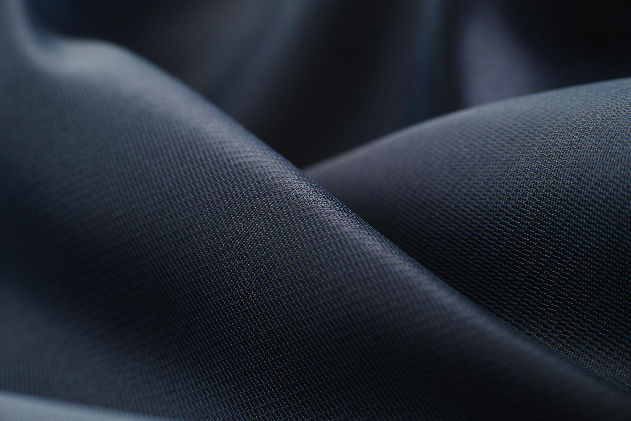 elegant close up of smooth dark satin fabric